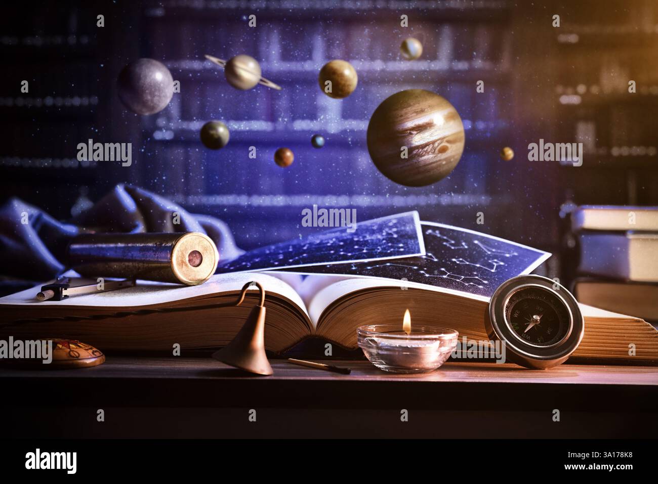 Concetto di conoscenza e consapevolezza delle stelle e dell'universo con un tavolo con un libro aperto e oggetti decorativi da esplorare con pianeti sospesi Foto Stock