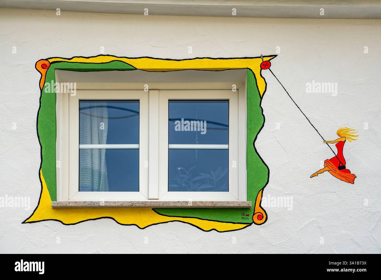 Finestre colorate e fiabesche nell'area esterna Foto Stock