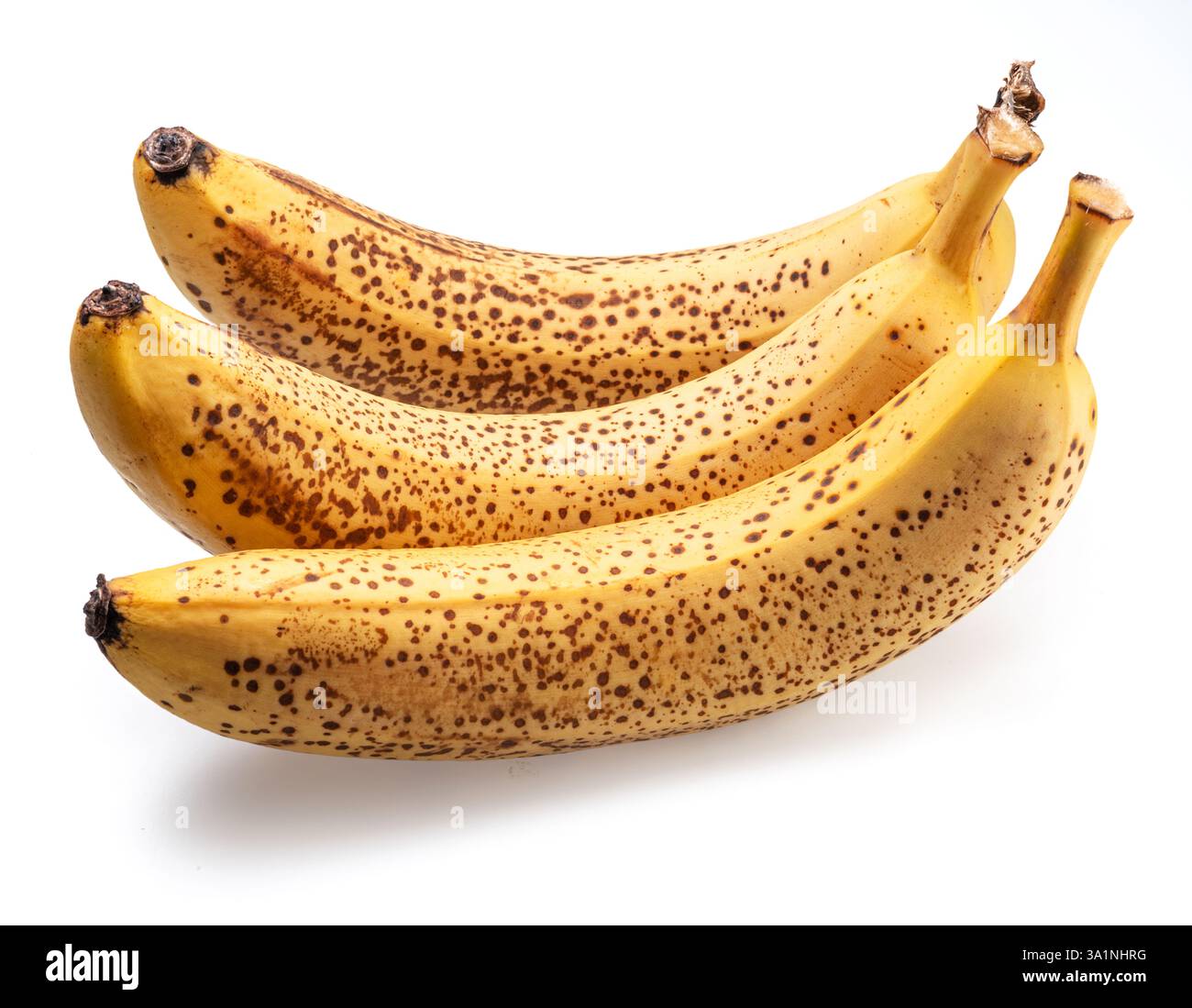 Banane con macchie nere al primo posto della sua dolcezza isolate su bianco. Foto Stock