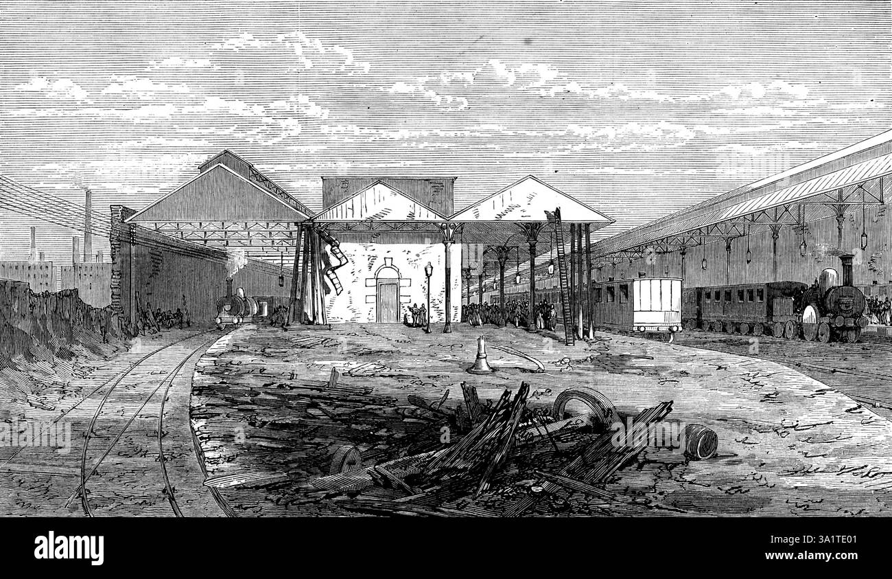 Scena dell'incidente ferroviario a Wigan, 1873. Vista che mostra '...la posizione in cui le carrozze sono state gettate quando sono partite dal treno, con il caos causato dalla violenta commozione cerebrale...Un terribile incidente, che ha causato la morte di dodici passeggeri e gravi ferite a molti altri, si è verificato sulla London and North-Western Railway, alla stazione di Wigan, al treno espresso notturno dei turisti da Londra alla Scozia... Quando... il treno si avvicinò a Wigan, i segnali mostravano "tutto bene"....i due motori (entrambi erano alla testa) e diciassette o otto Foto Stock