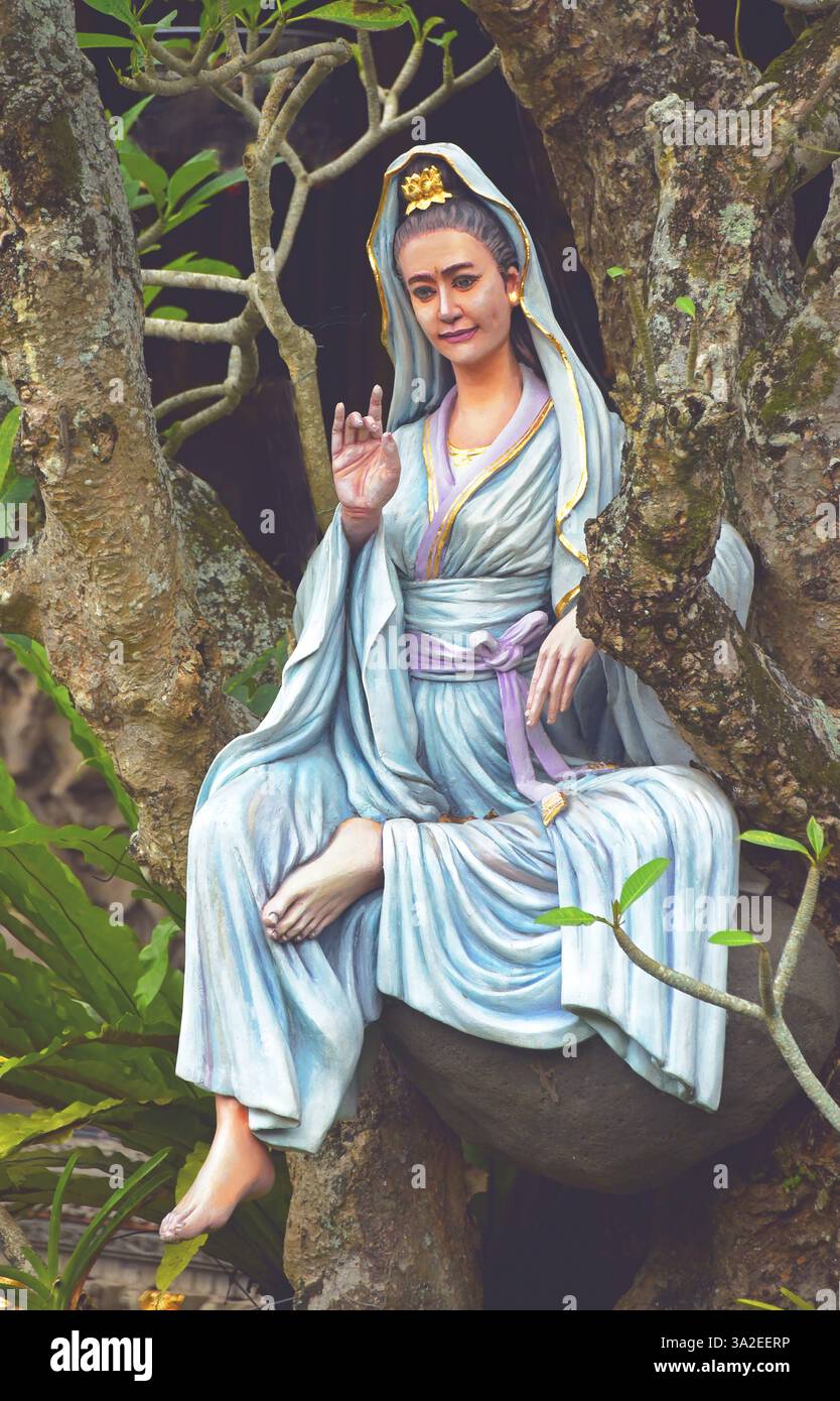 Tempio Puri Lagon, immagine di una delle tante dee che combinano la cultura buddista e indù, Indonesia, Bali, Ubud Foto Stock