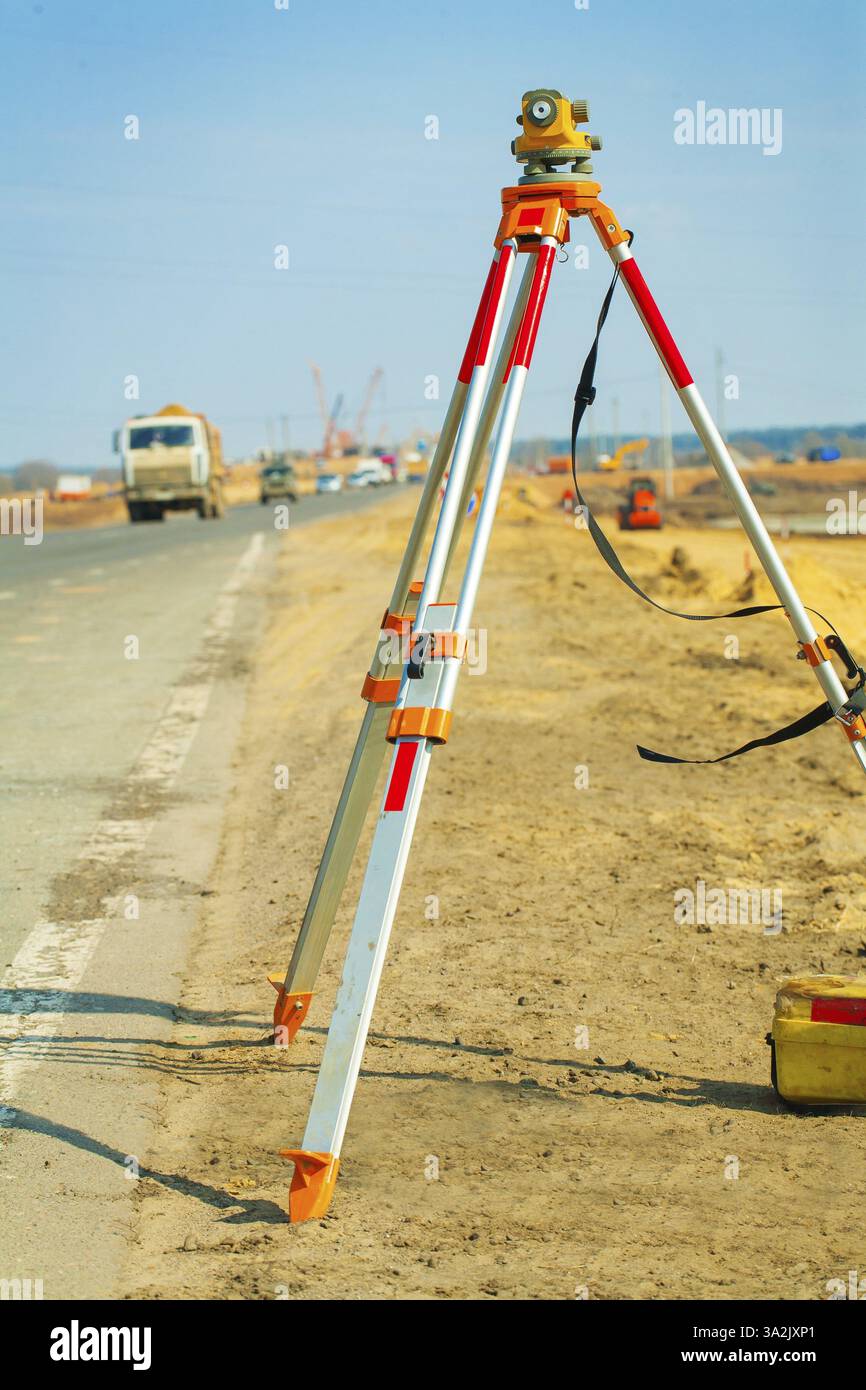 Theodolit in cantiere all'aperto Foto Stock