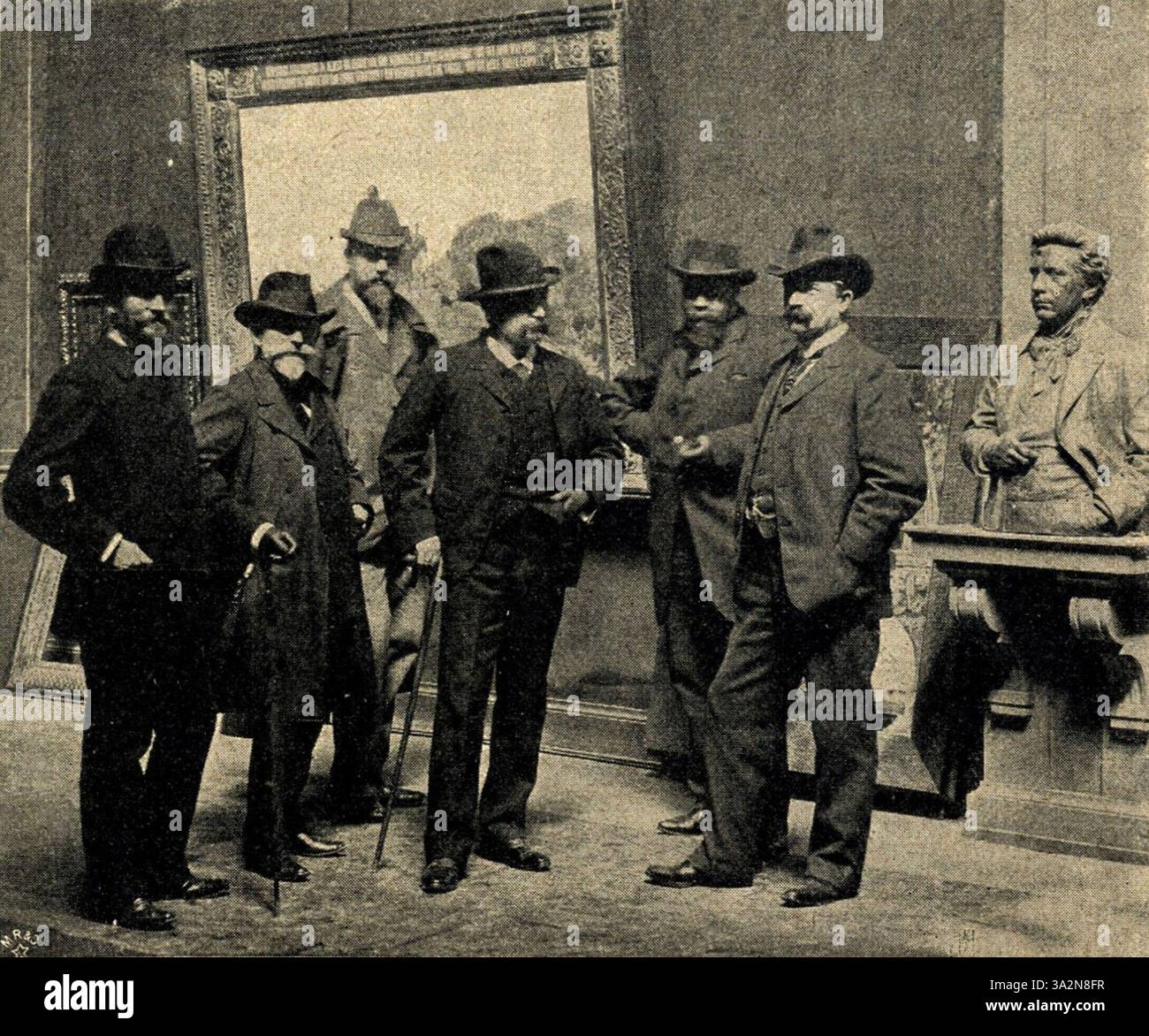 Questa opera d'arte presenta una scena ritagliata dei membri della giuria della grande mostra d'arte di Berlino del 1900. Il lavoro mostra le persone coinvolte nel processo di selezione dell'evento. Il ritratto offre uno scorcio nell'atmosfera formale che circonda la mostra. Foto Stock