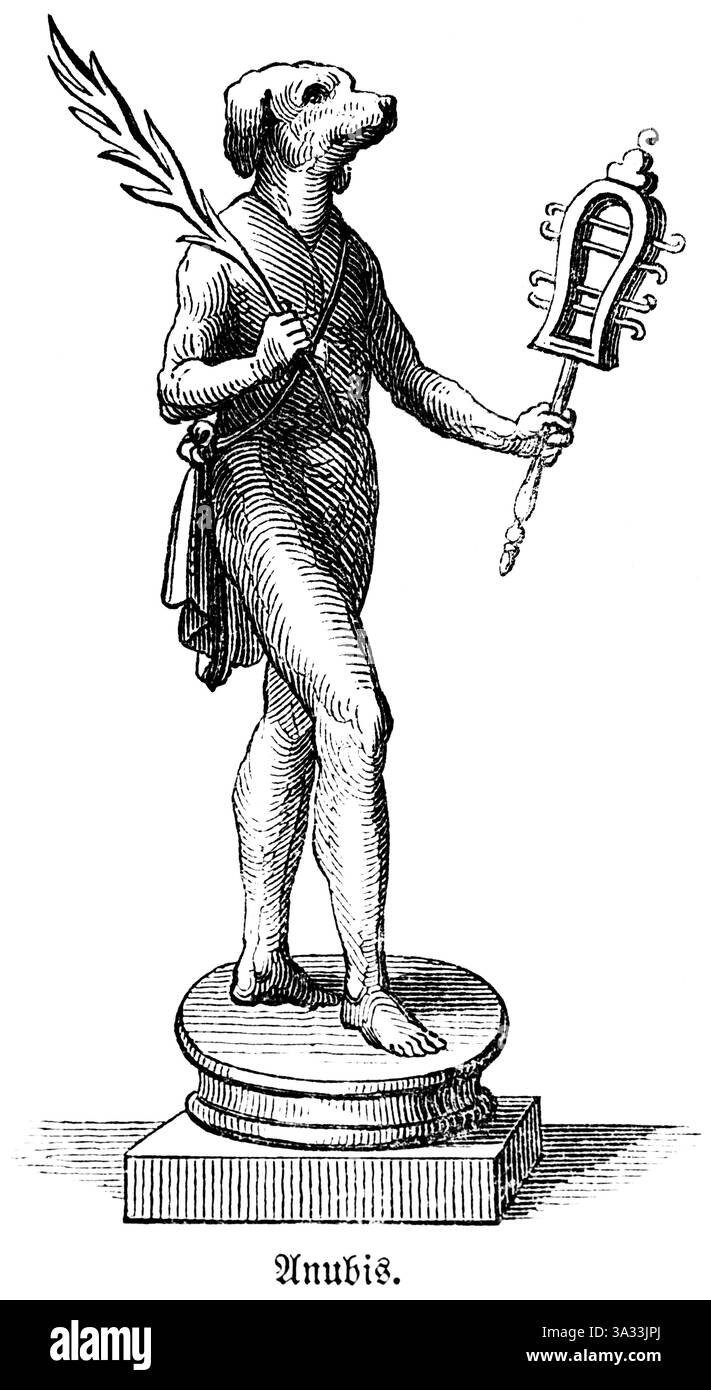 Anubis o Nebaha è una divinità dorata degli antichi Egizi con la testa di un cane e un sistro, un sonaglino, nella mano sinistra, un protettore e un guardiano Foto Stock