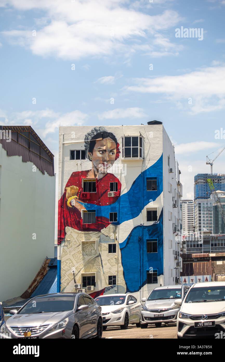 Murale a Johor Bahru raffigurante una donna malese Foto Stock