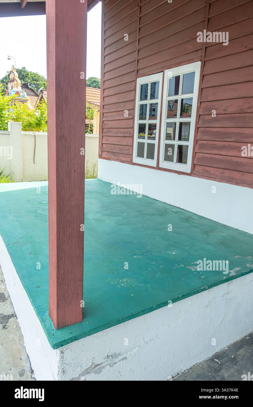 La struttura della casa in legno con rivestimento verticale. Chitty Village di Malacca City, Foto Stock