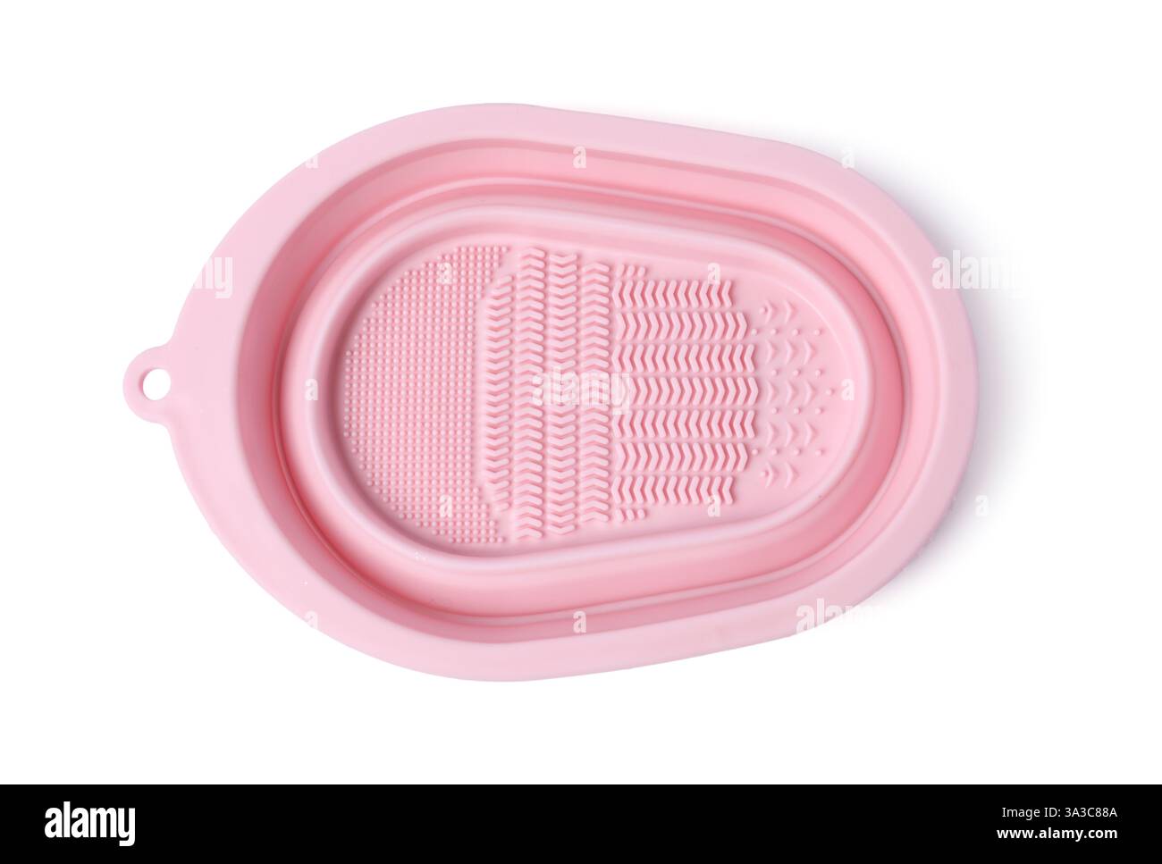 Tampone in silicone per la pulizia delle spazzole per il trucco isolato su bianco, vista dall'alto Foto Stock