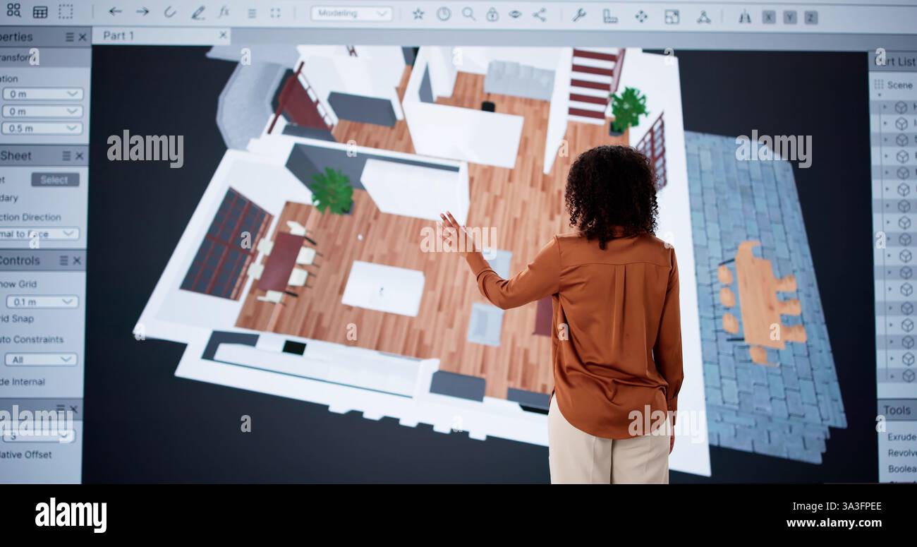 Architetto che utilizza software 3D per l'analisi della planimetria della casa per la ristrutturazione. Foto Stock