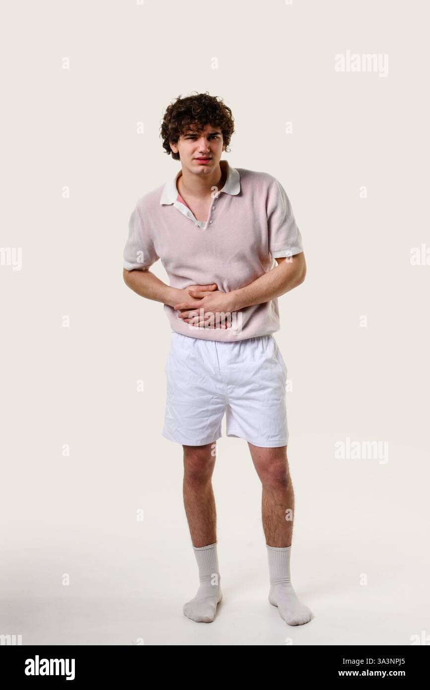 Appendicite. Sensazione di dolore addominale acuto e crampi dovuti alla colite. La colite ulcerosa aspecifica influisce negativamente sull'intestino crasso. Sofferenza Foto Stock