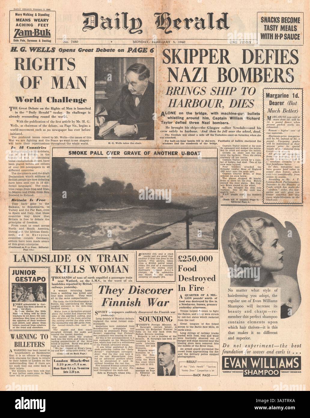 1940 prima pagina Daily Herald nave mercantile britannica sfida i bombardieri tedeschi e H.G. Wells discute i diritti dell'uomo Foto Stock