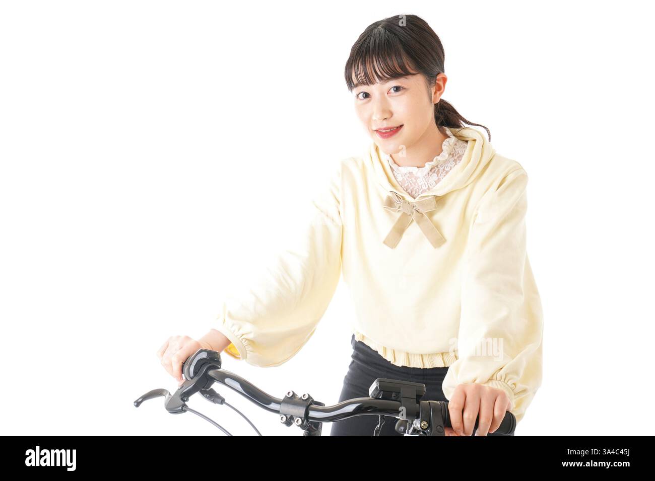 Giovane donna di una bicicletta Foto Stock