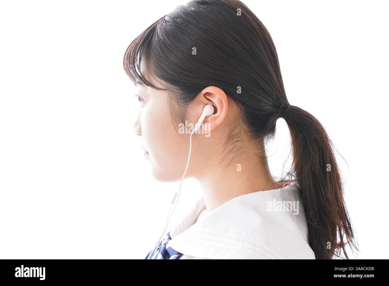 Studenti che ascoltano musica Foto Stock