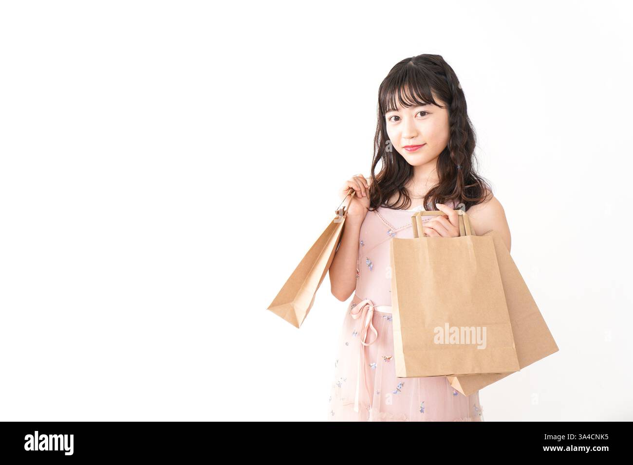 Giovane donna shopping Foto Stock