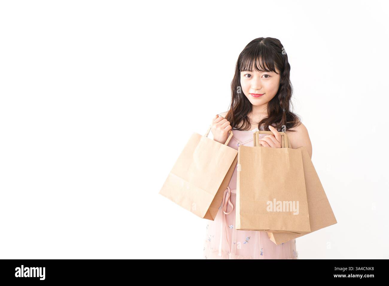 Giovane donna shopping Foto Stock