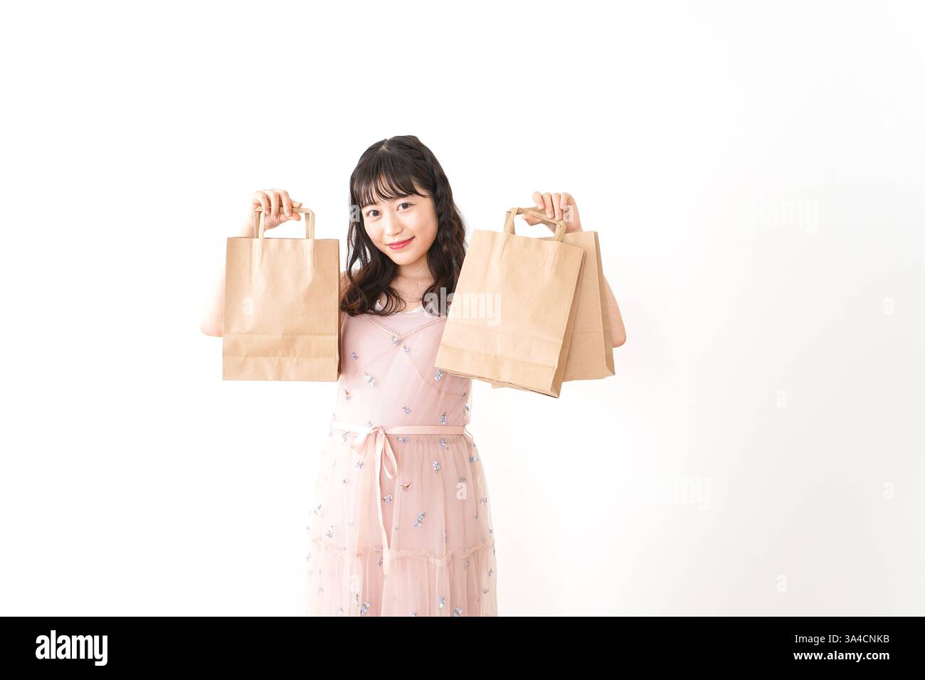 Giovane donna shopping Foto Stock