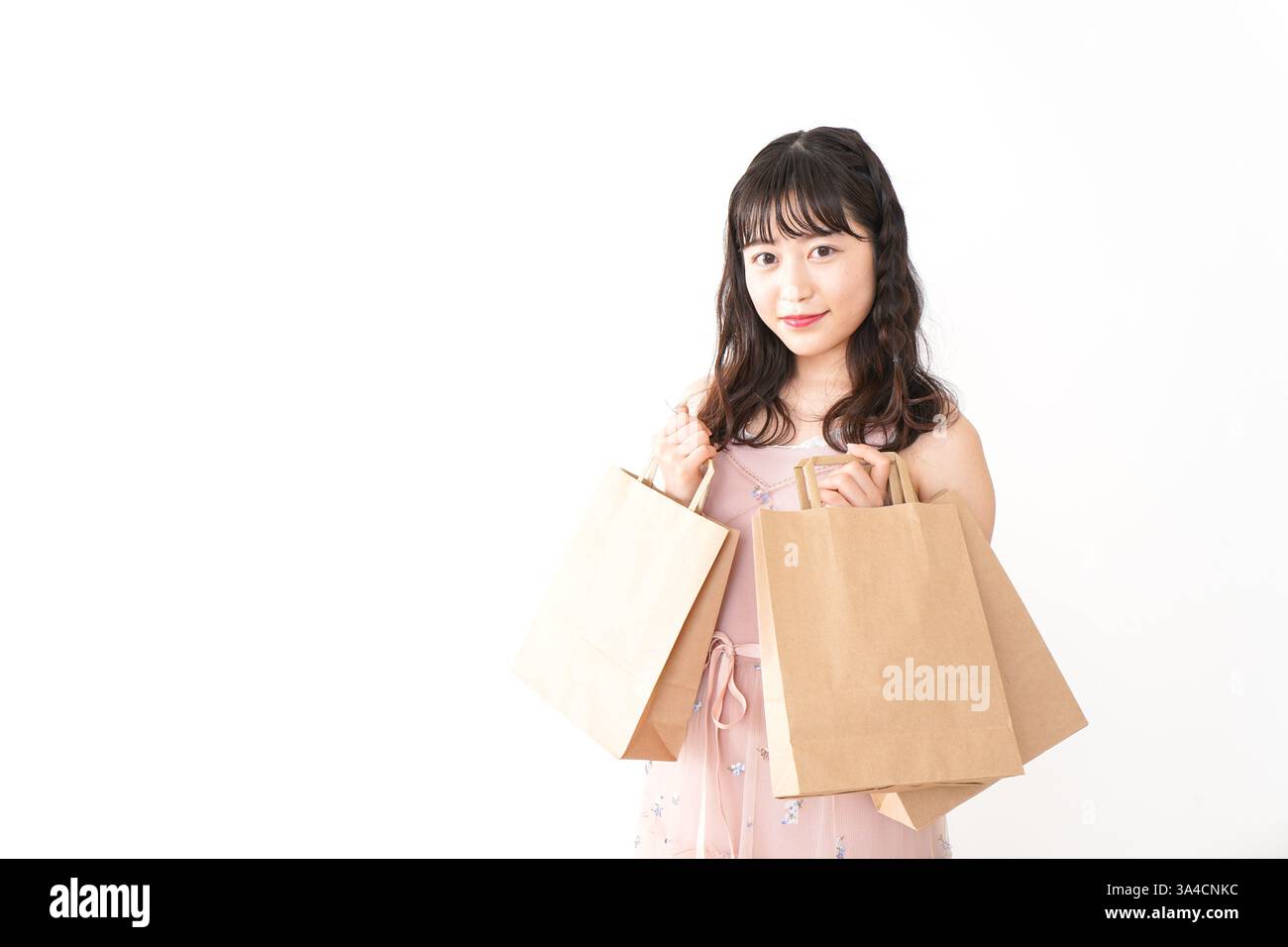 Giovane donna shopping Foto Stock