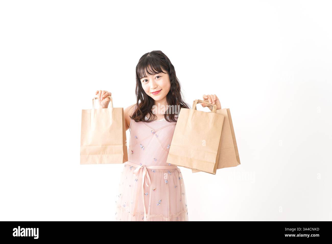 Giovane donna shopping Foto Stock