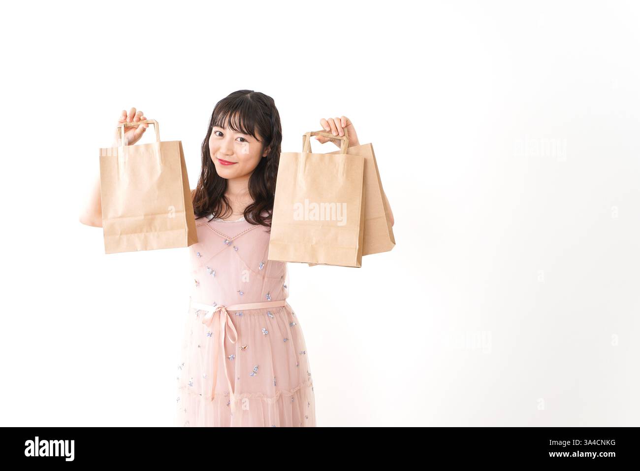 Giovane donna shopping Foto Stock