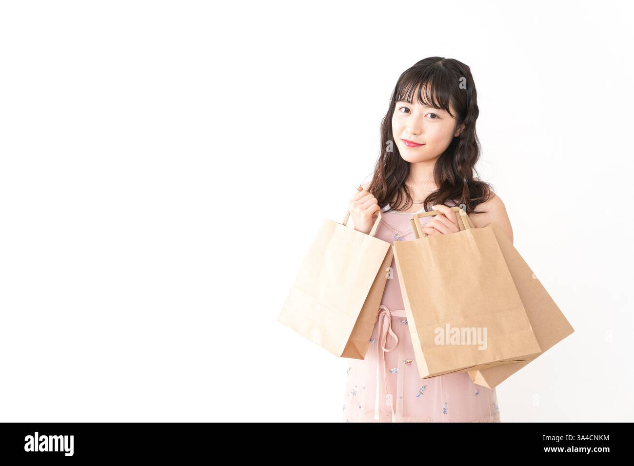 Giovane donna shopping Foto Stock