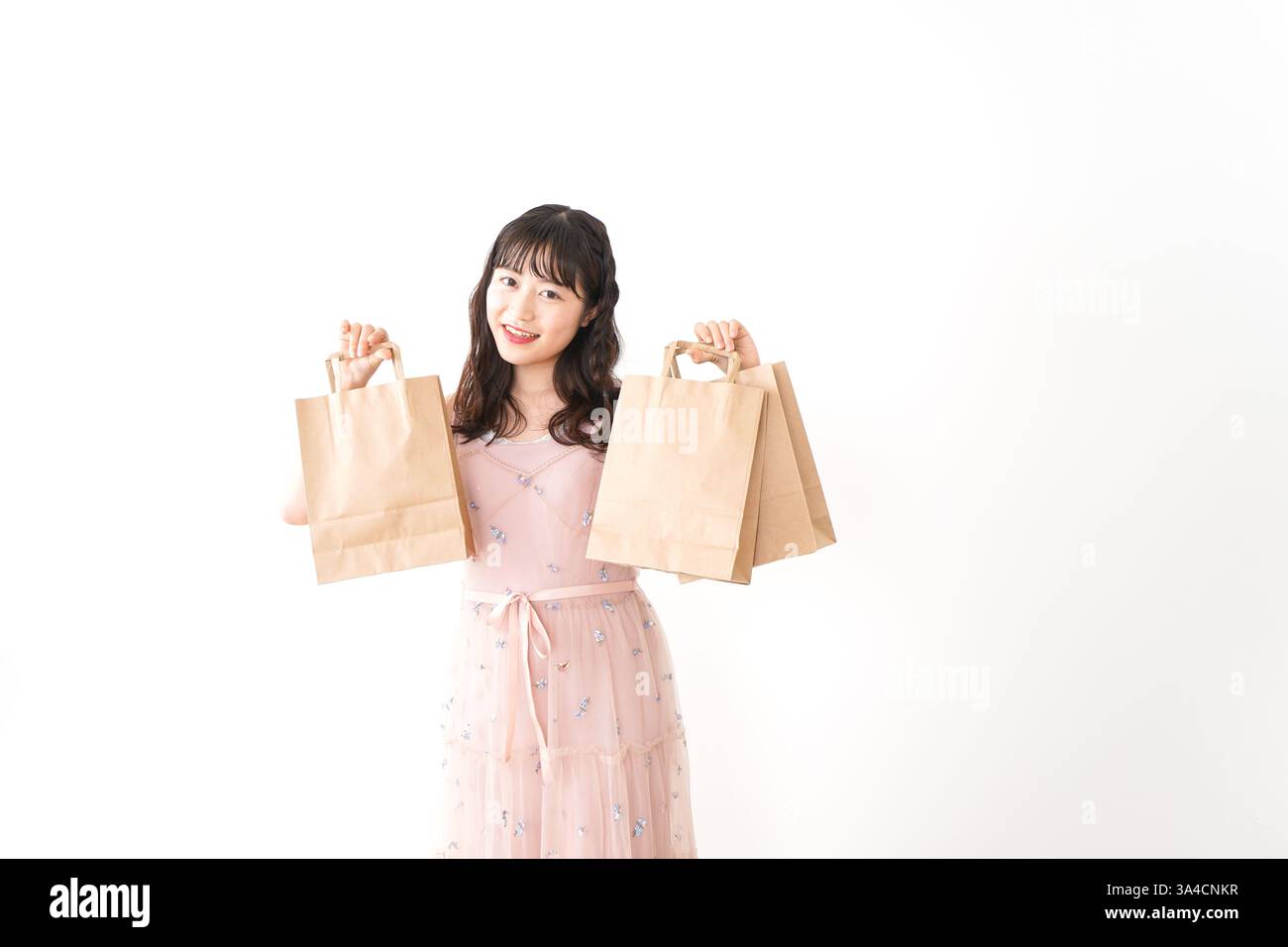 Giovane donna shopping Foto Stock