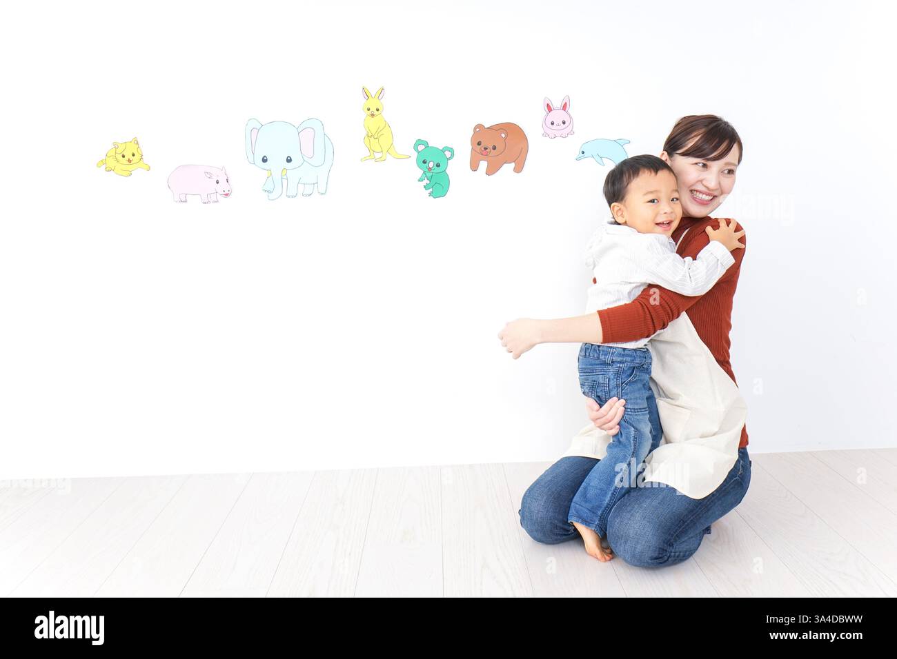 Bambini e insegnanti che giocano alla Festa dei bambini, alla scuola materna e all'asilo Foto Stock