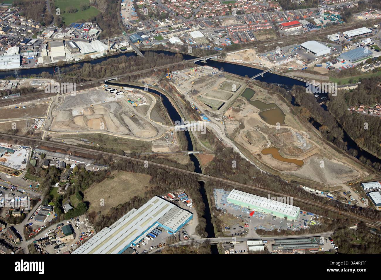 aerial view of development land around the River Calder & the Calder and Hebble Navigation Canal at Ravensthorpe, Dewsbury, West Yorkshire Foto Stock