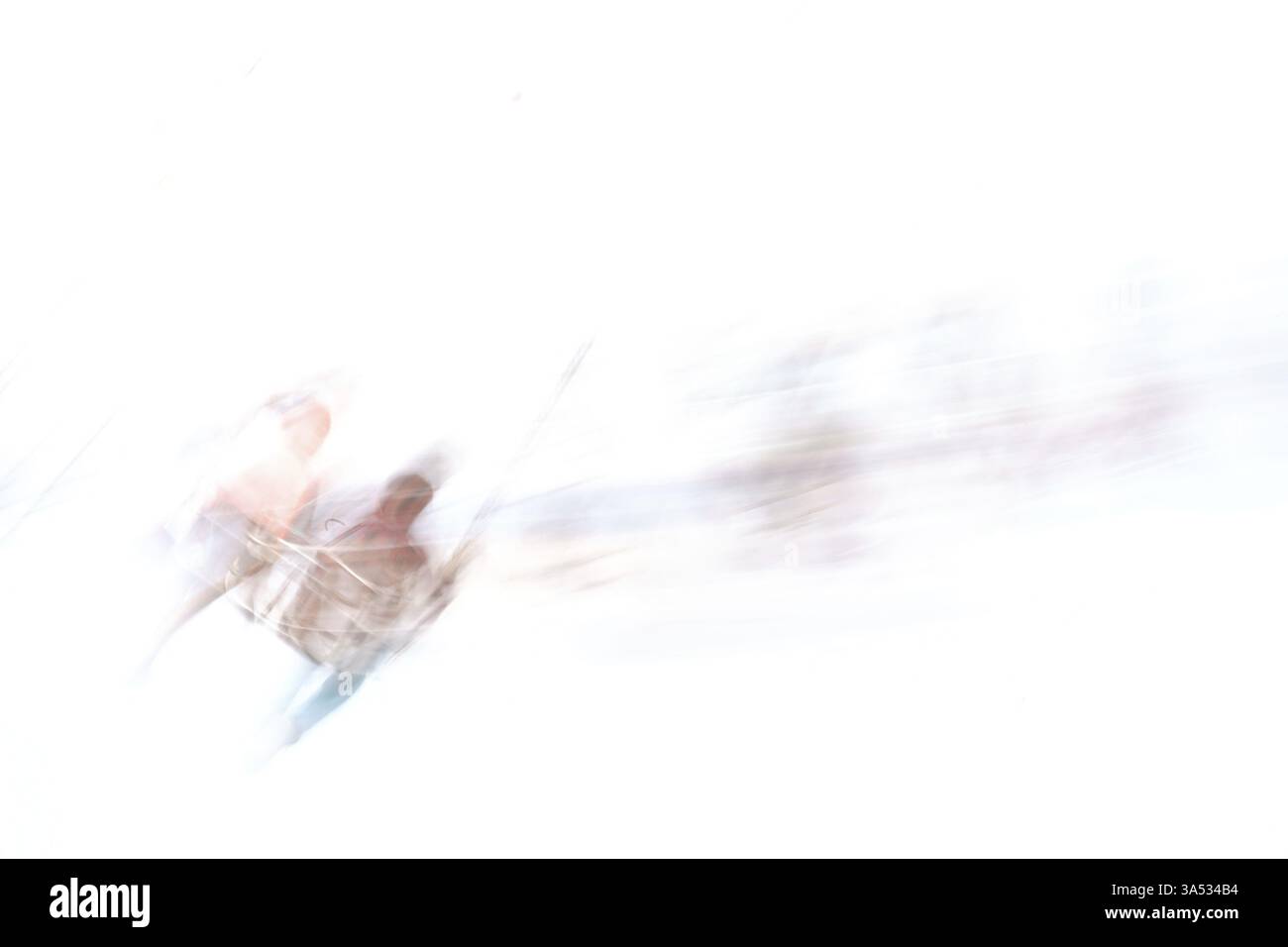 Le sagome astratte dei sedili e dei visitatori su una giostra a catena rotante Foto Stock