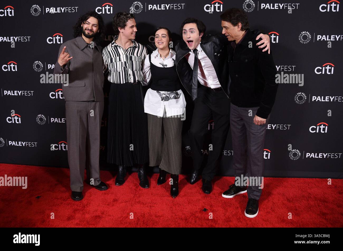 Xolo Maridueña, from left, Tanner Buchanan, Mary Mouser, Gianni DeCenzo and Ralph Macchio arrive at a screening of "Cobra Kai" during PaleyFest on Saturday, March 22, 2025, at the Dolby Theatre in Los Angeles. (Photo by Richard Shotwell/Invision/AP) Foto Stock