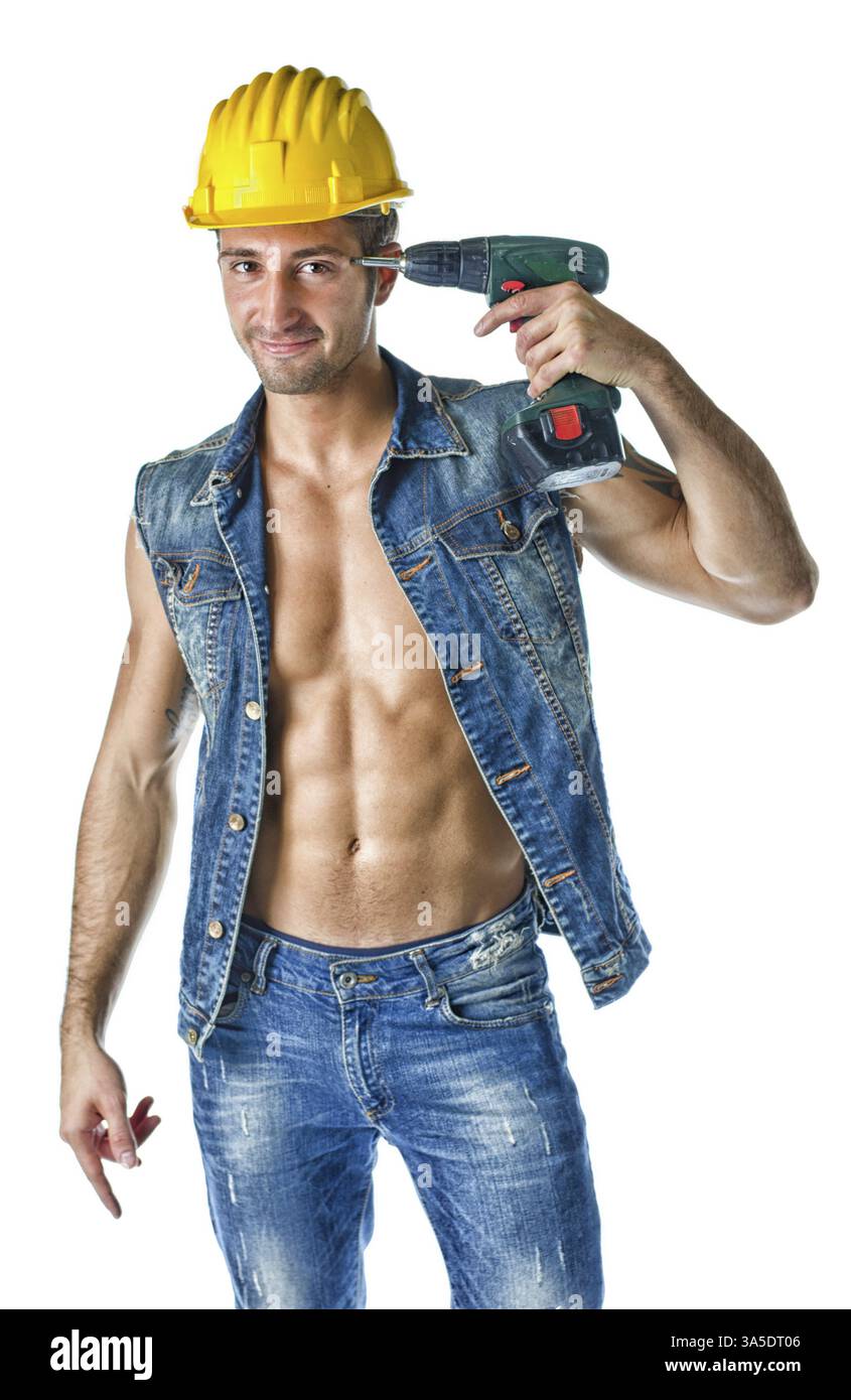 Attraente costruzione muscolare Lavoratore che indossa aperto camicia denim, isolato su bianco Foto Stock