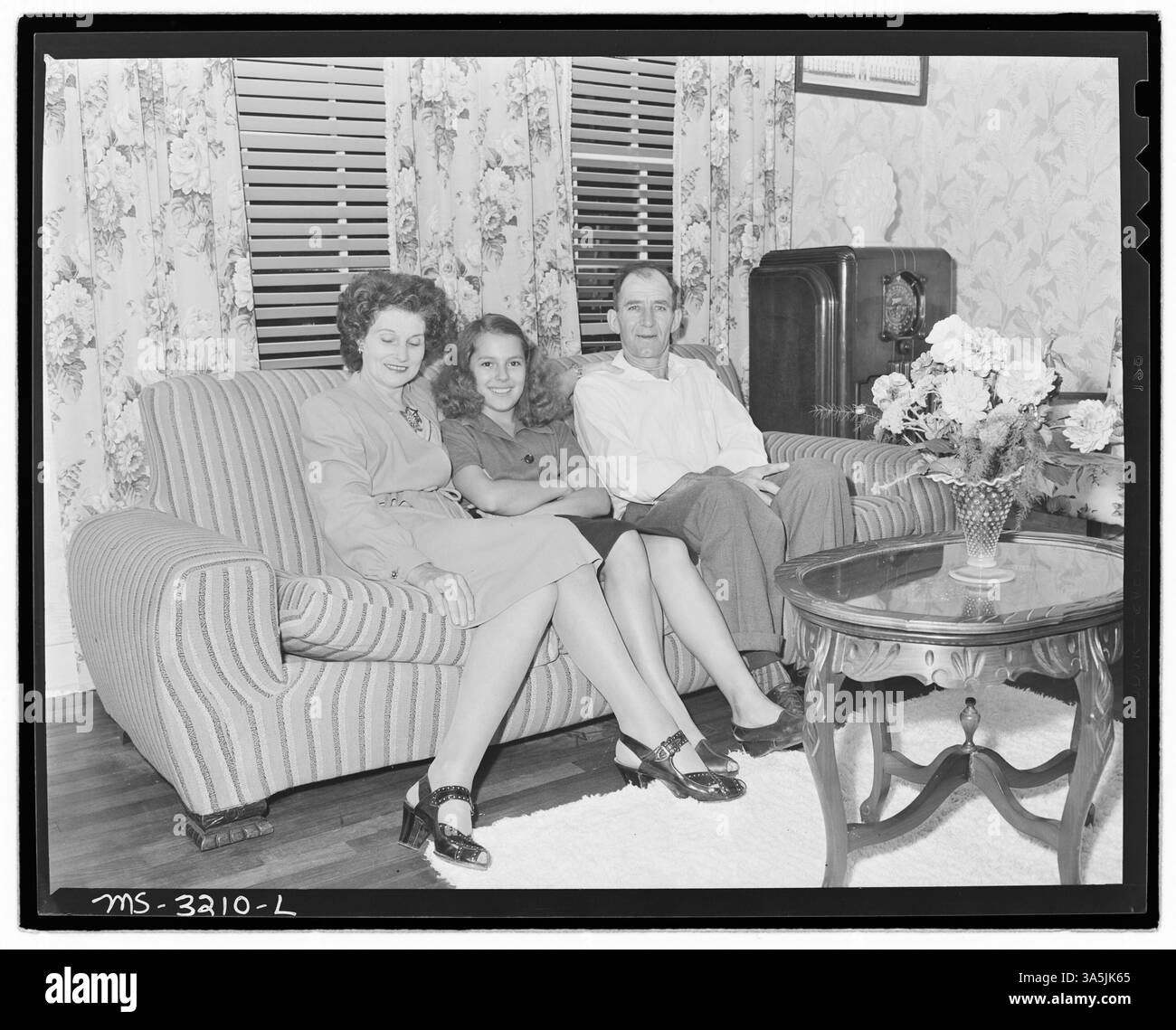 Una fotografia del minatore di carbone Harry Benner e della sua famiglia, che cattura la loro vita all'interno della comunità mineraria. Archivi nazionali. Foto Stock