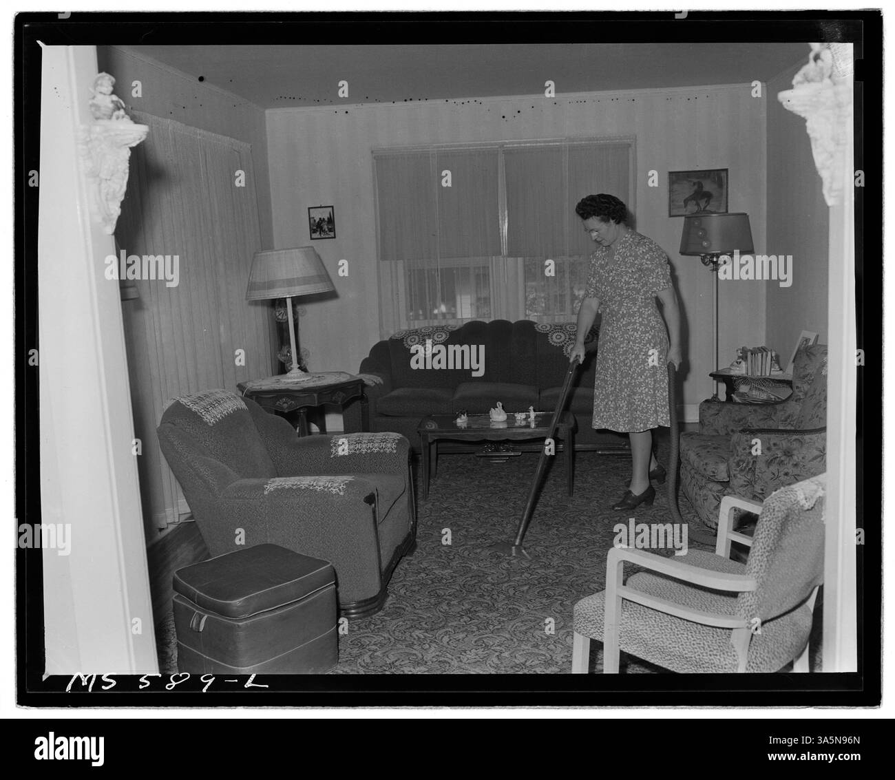 Un soggiorno nella casa di un minatore all'interno del progetto immobiliare della Columbia Steel Company a Columbia, Utah. Foto Stock