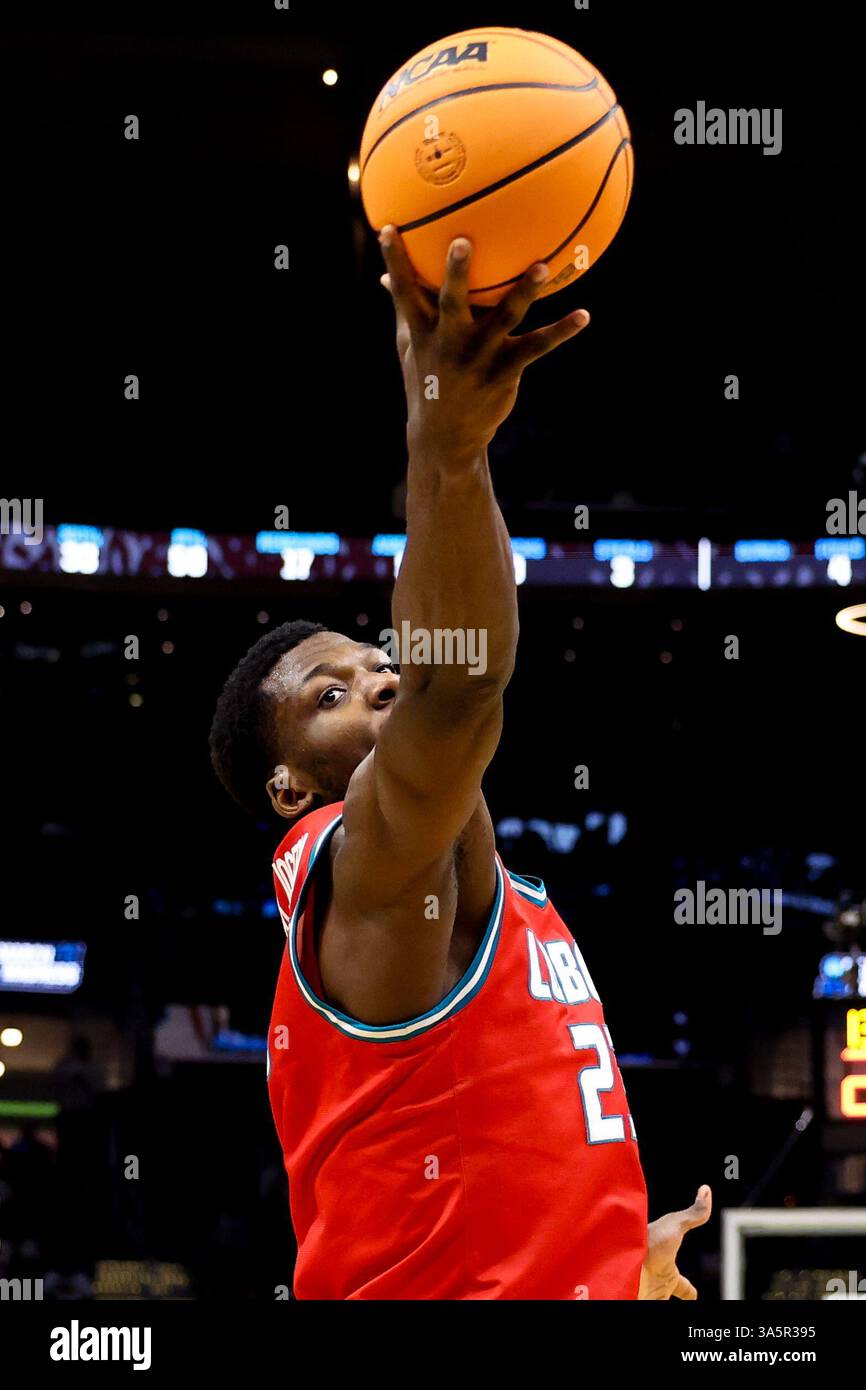 Cleveland, Ohio, Stati Uniti. 23 marzo 2025. New Mexico, il centro di Lobos Nelly Junior Joseph (23) va a rimbalzare durante la seconda metà del torneo di pallacanestro maschile New Mexico vs Michigan State NCAA - South Region - 2° round alla Rocket Arena di Cleveland, Ohio. Brian Fisher/CSM (immagine di credito: © Brian Fisher/Cal Sport Media). Crediti: csm/Alamy Live News Foto Stock
