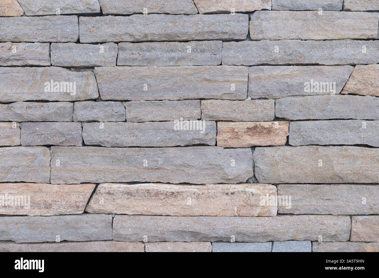 Sfondo grigio della struttura della parete in pietra Foto Stock