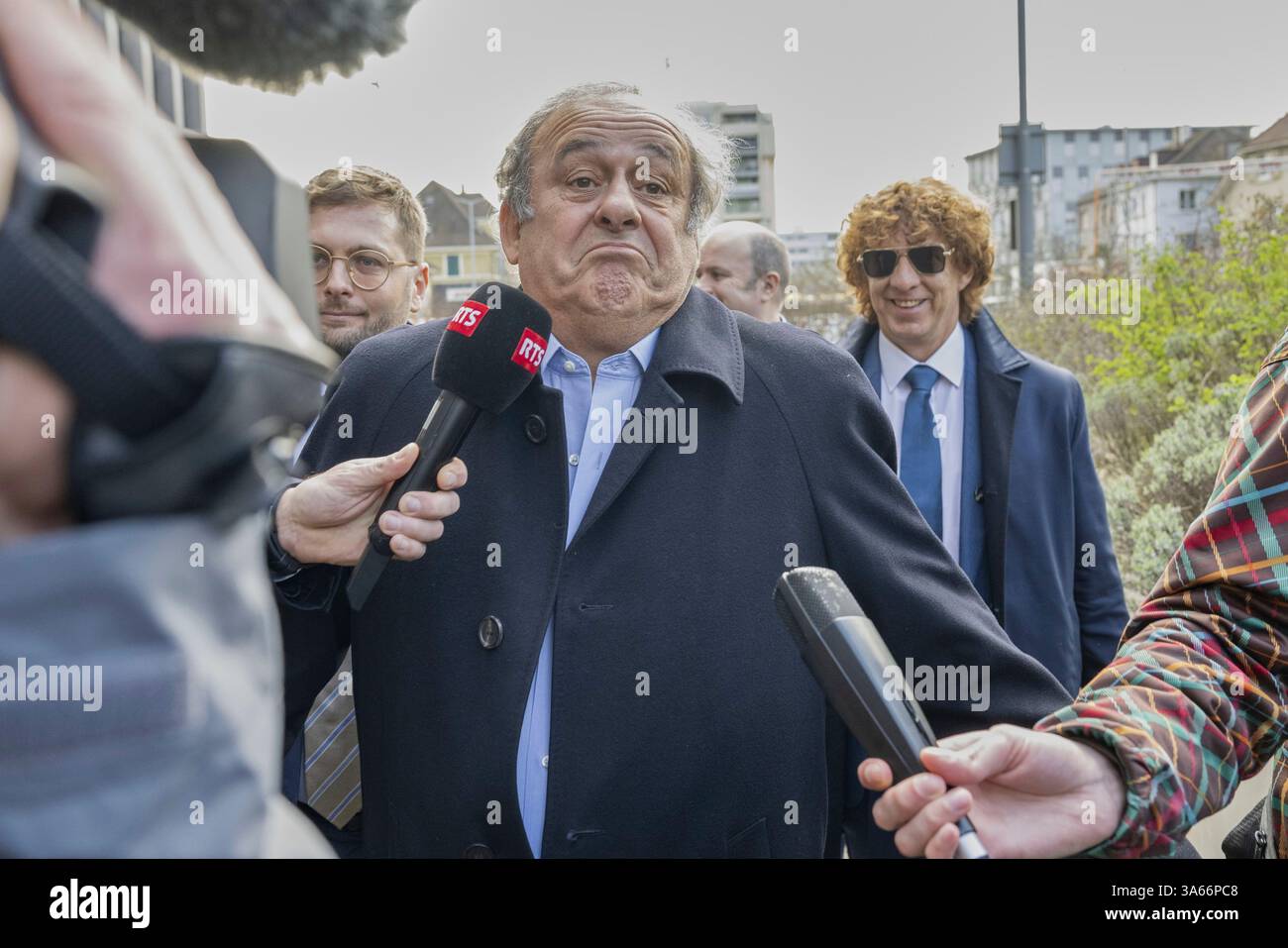 Former UEFA President, Michel Platini, centre, and his Lawyer Dominic Nellen, left, arriving to the verdict at the special appeals court, in Muttenz, Switzerland, Tuesday, March 25, 2025. (Urs Flueeler/Keystone via AP) Foto Stock
