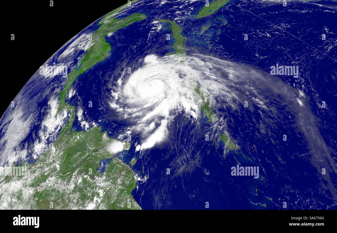 10 settembre 2004; Miami, FL, USA; L'URAGANO IVAN raggiunge lo status di Categoria 4 sulla scala dell'uragano Saffir-Simpson, che si estende appena a sud di Cuba e copre completamente la Giamaica. L'uragano Ivan si è abbattuto sulla Giamaica venerdì, minacciando un colpo diretto sulla sua capitale densamente popolata dopo aver devastato Grenada e aver ucciso almeno 33 persone. Foto Stock