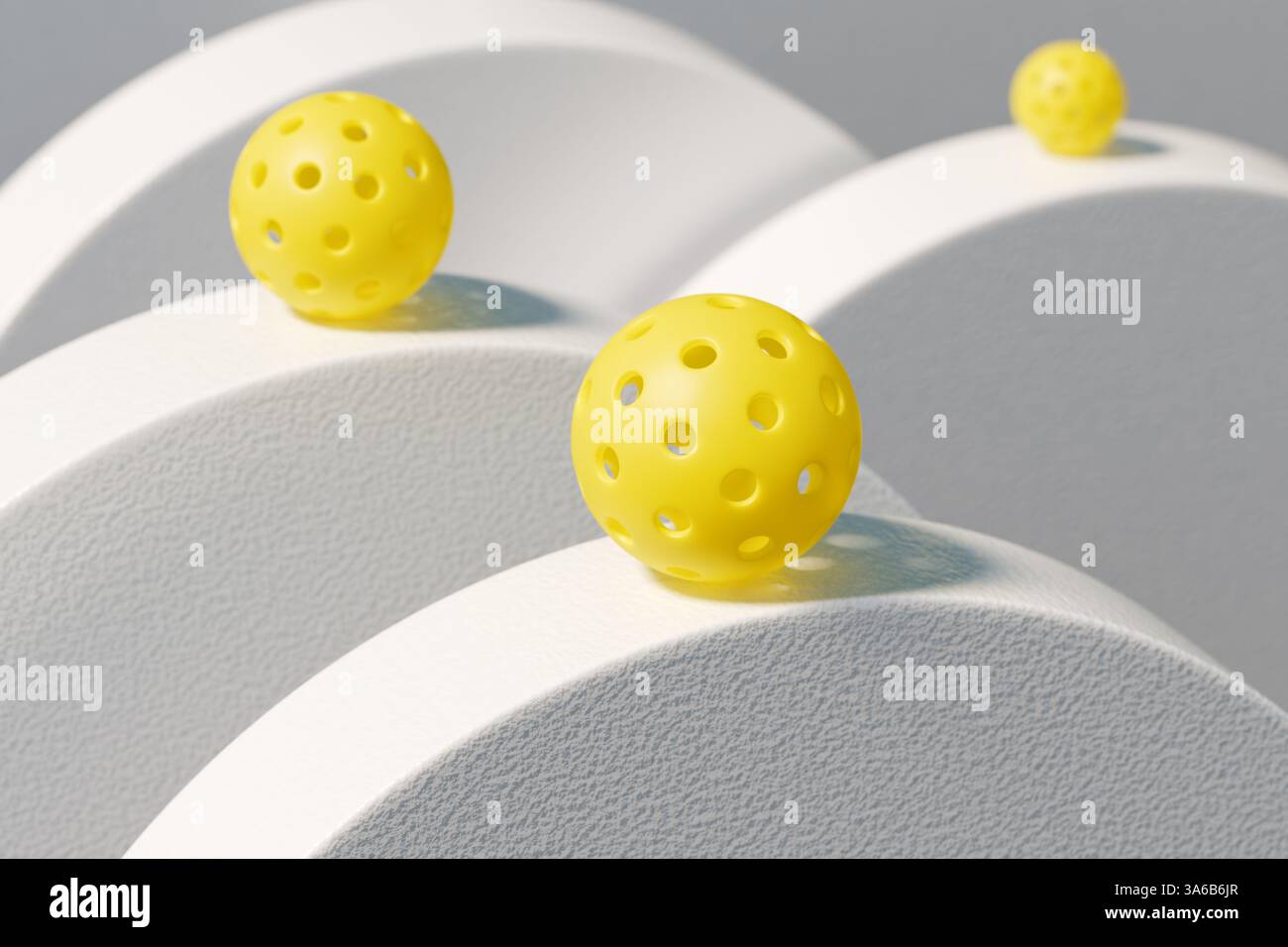 Palline di sottaceti gialle su curve bianche creano una scena divertente. rendering 3d. Foto Stock
