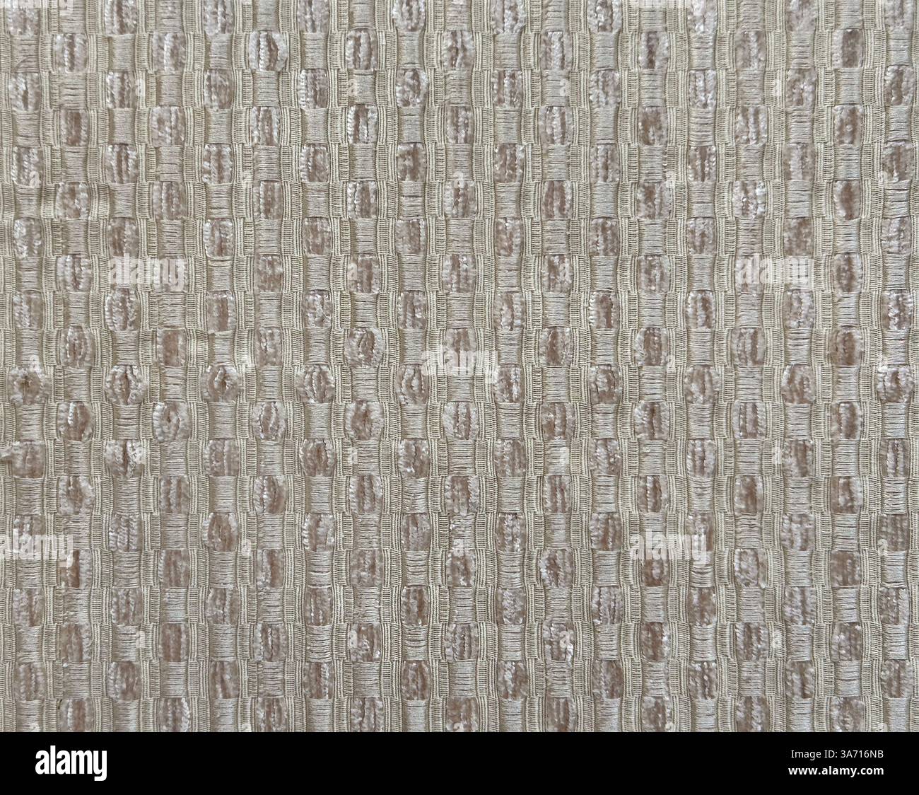 Foto ravvicinata di una splendida trama in tessuto bianco. Il tessuto presenta un motivo rettangolare in forme ripetute casuali. Texture di sfondo senza cuciture. Foto Stock