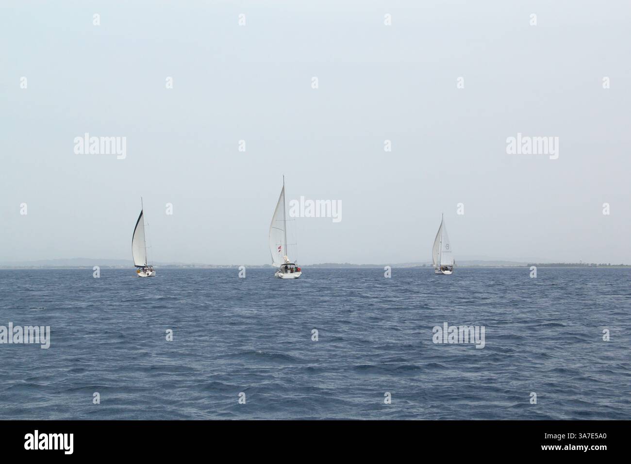 Tre barche a vela in Grecia Foto Stock