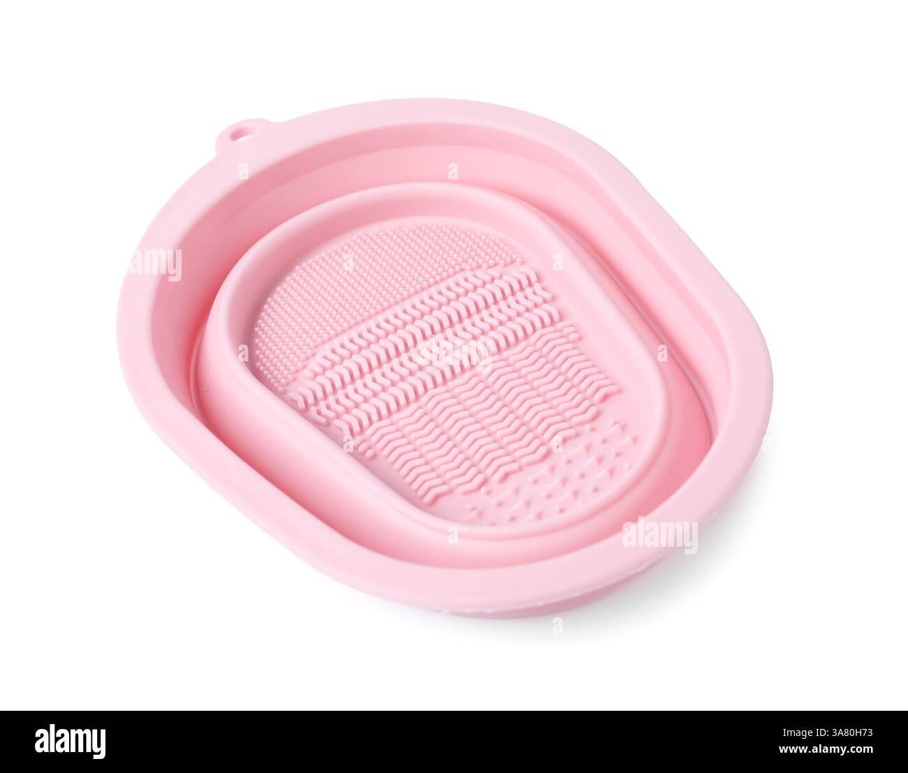 Tampone in silicone per la pulizia delle spazzole per il trucco isolato su bianco Foto Stock