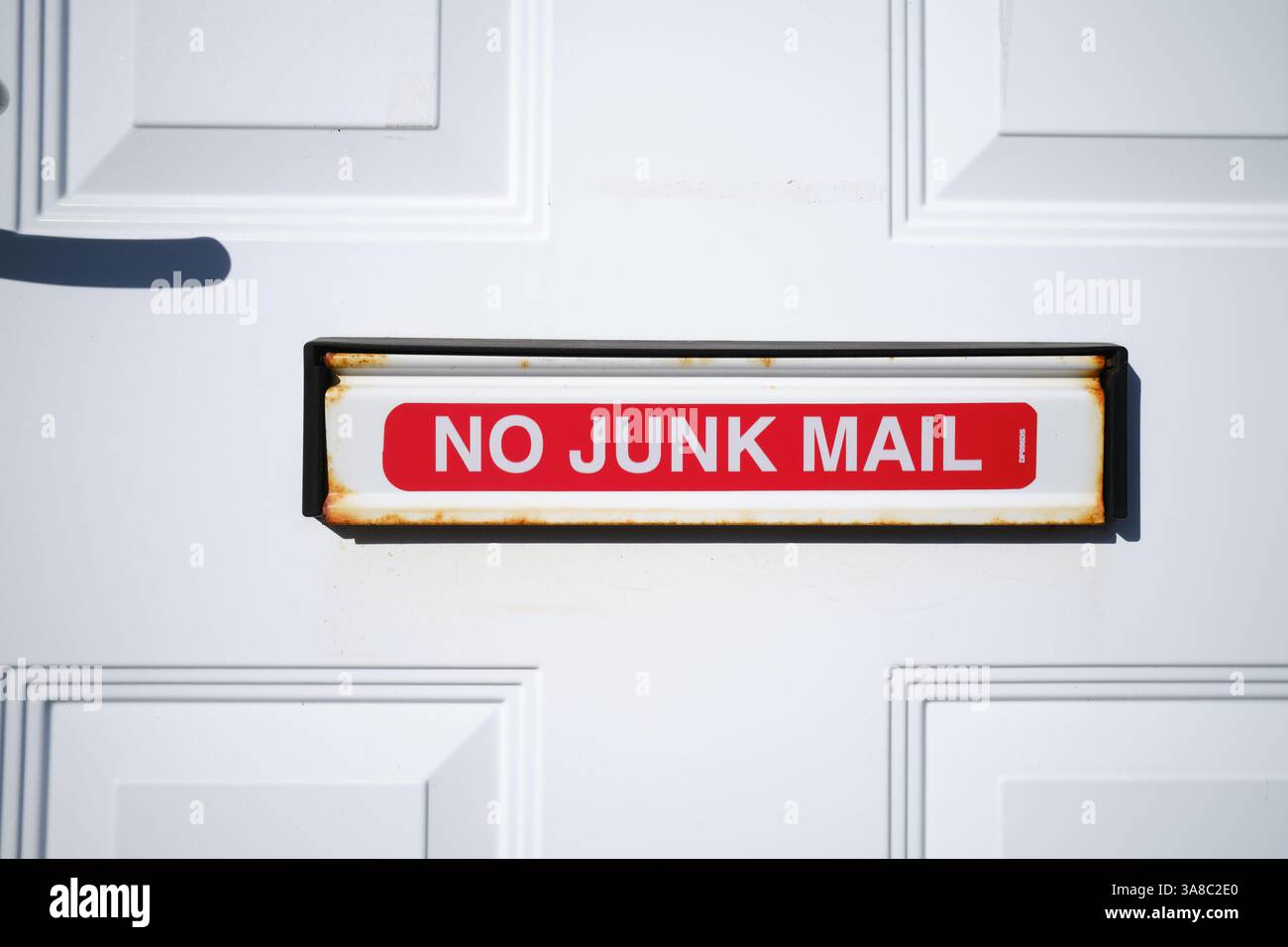 Messaggio "No Junk mail" bloccato su una cassetta della lettera di casa Foto Stock