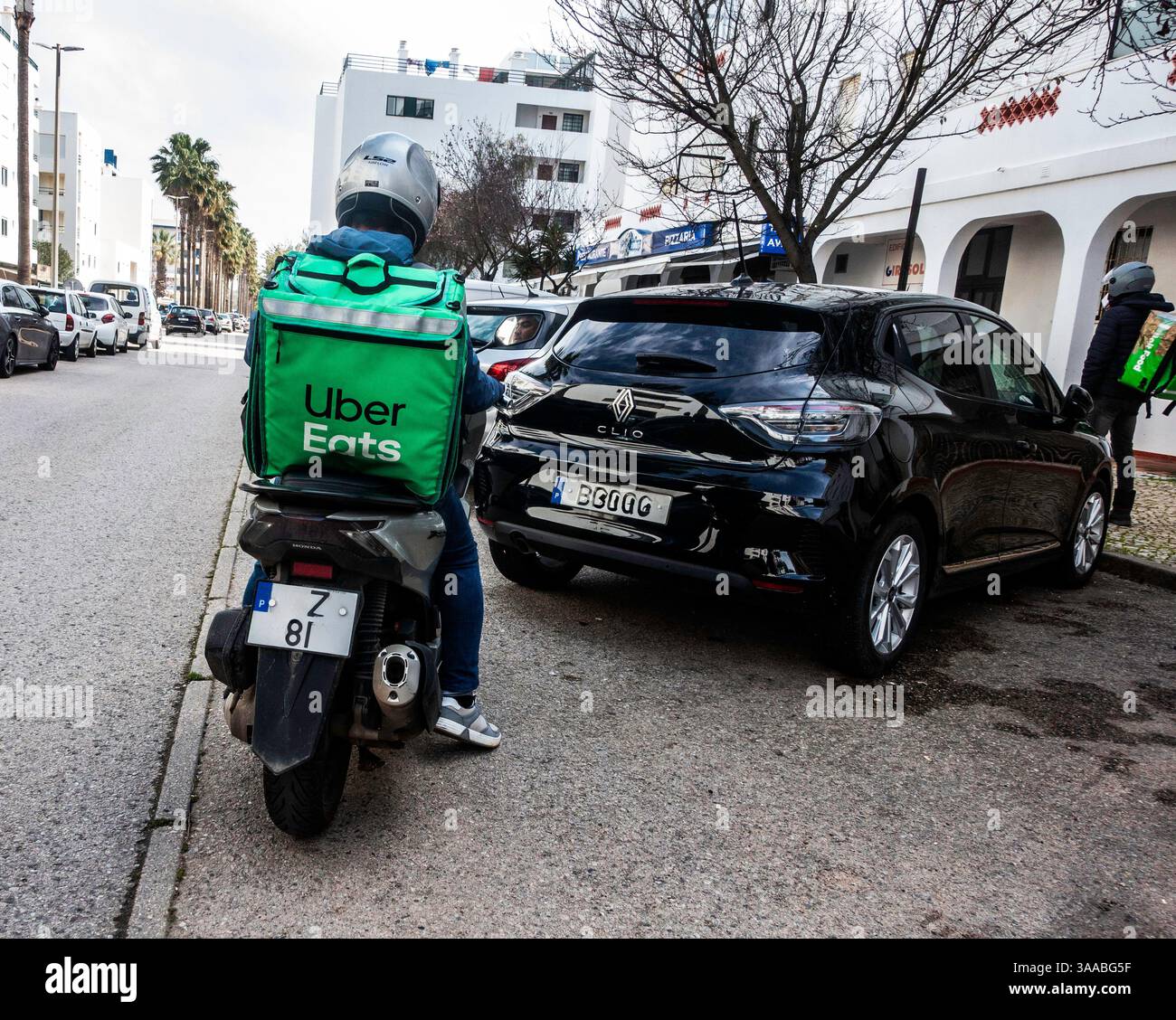 Corriere per Uber Eats Foto Stock