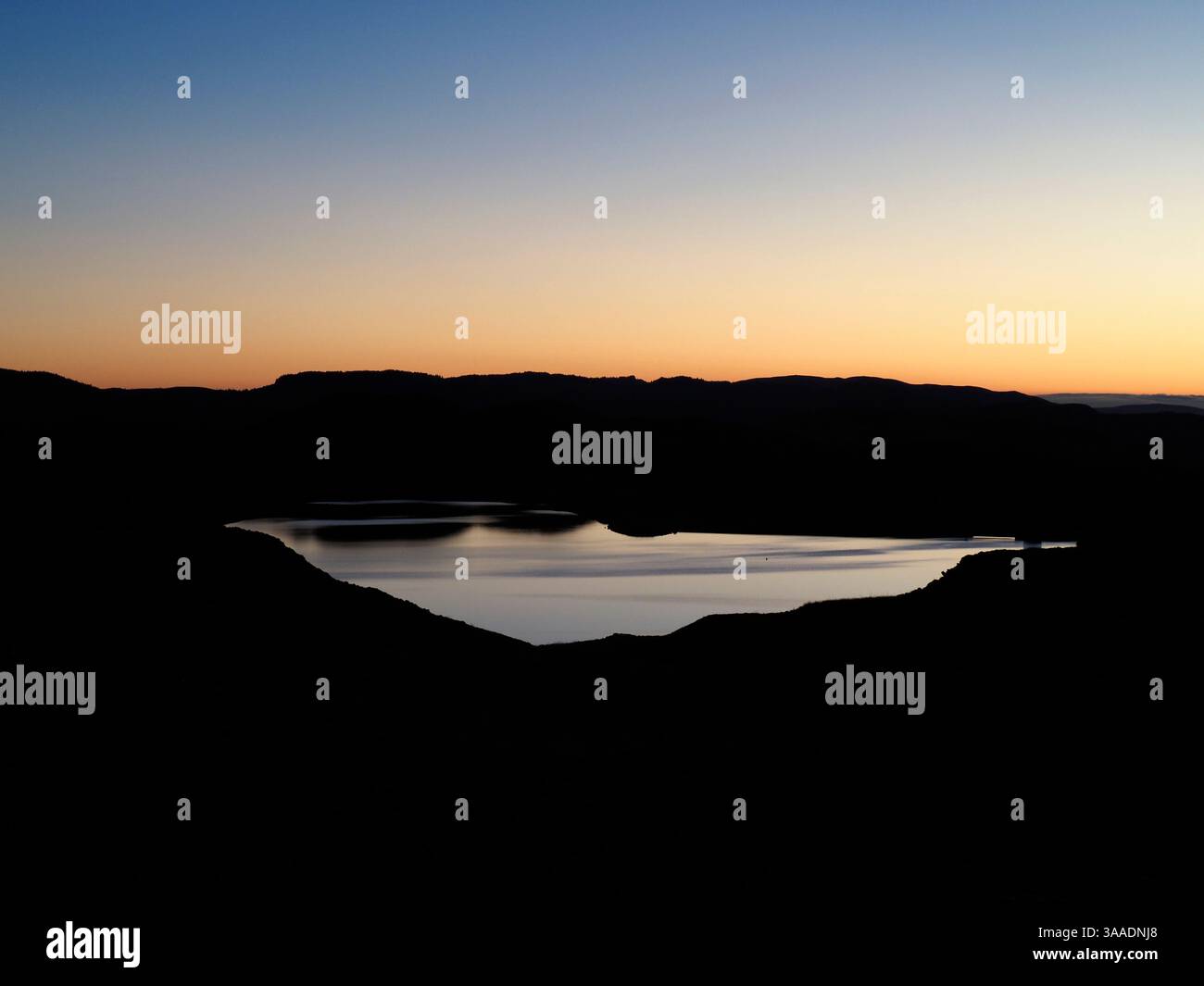 Crepuscolo su Llyn Teifi, Galles Foto Stock