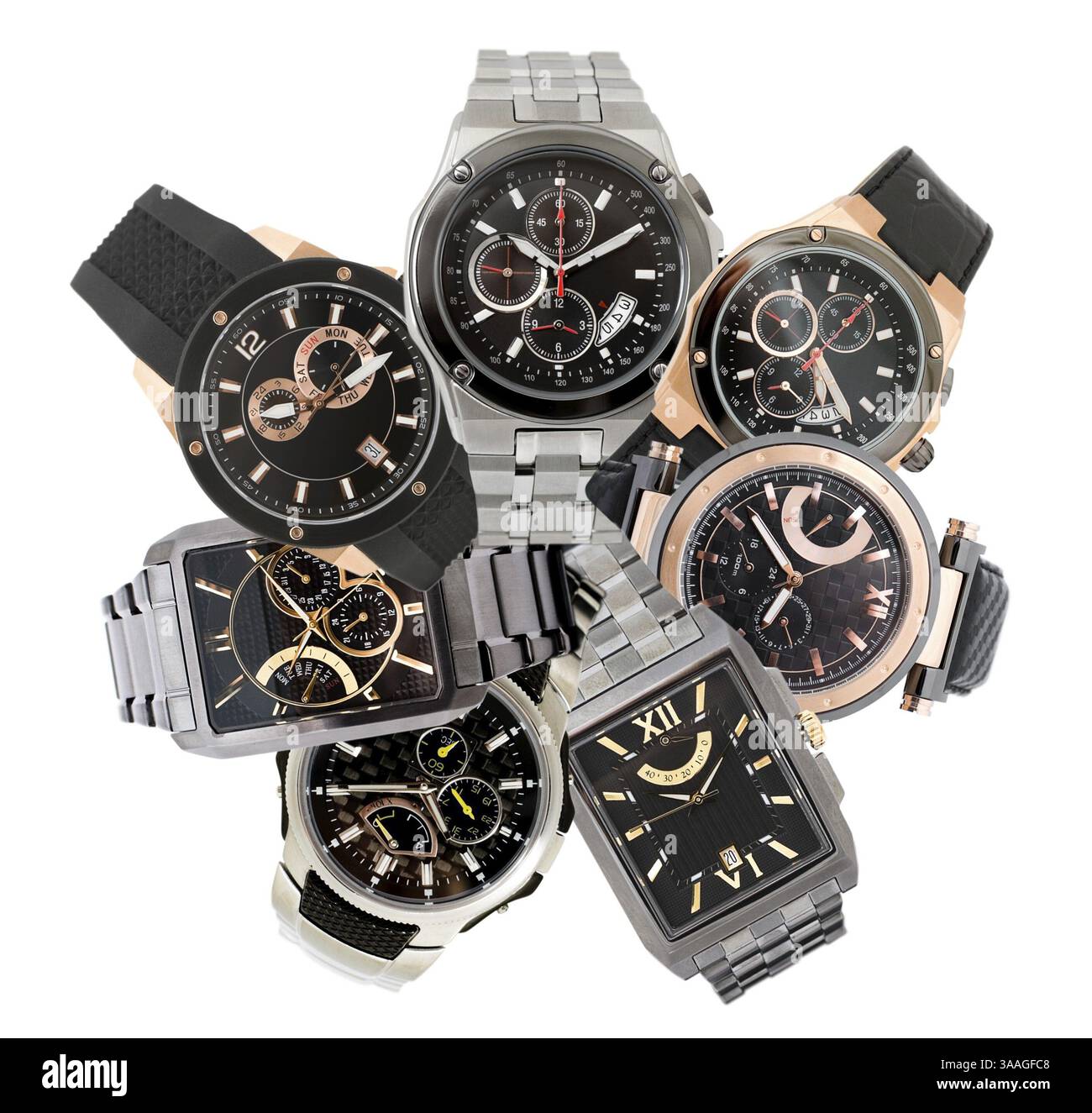 Una serie di sette orologi da uomo diversi su bianco Foto Stock