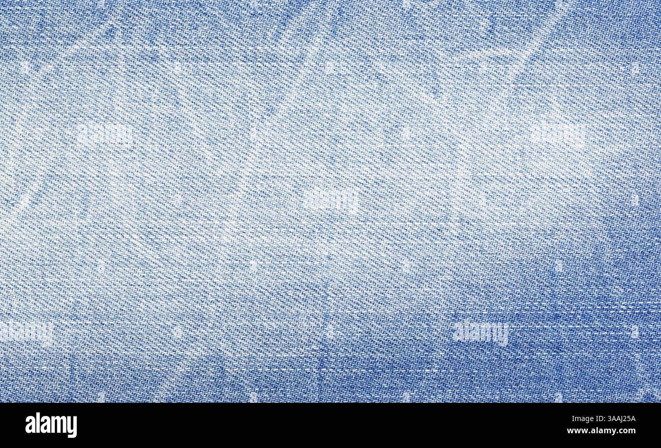 Denim blu invecchiato artificialmente, primo piano Foto Stock