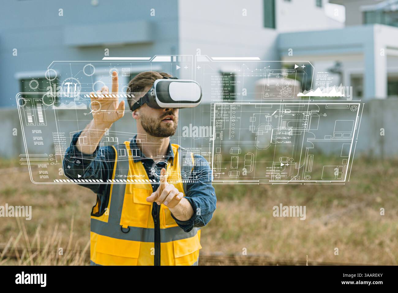 Progettare un lavoratore maschile utilizzando la realtà virtuale visiva o la realtà aumentata nel settore edile. Innovazione digitale moderna nella progettazione Foto Stock