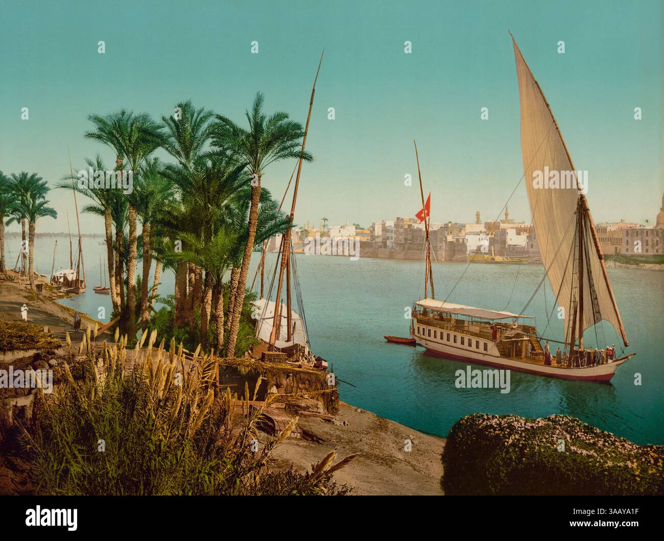 Stampa fotocromatica di un dahabeah che naviga sulla riva del Nilo vicino a Boulac, il Cairo, Egitto. Foto Stock