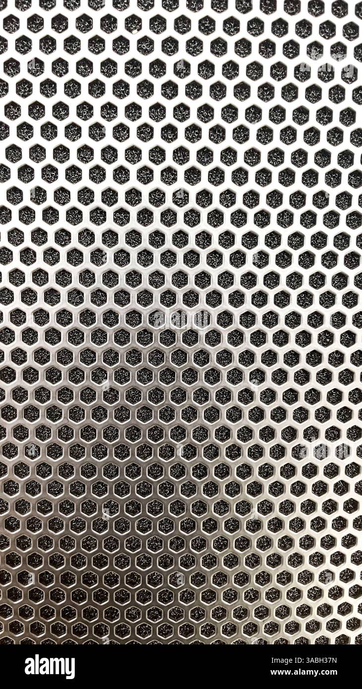 Metallo esagonale dello sfondo con la riflessione della luce sfondo ideale - Immagine stock catturata con smartphone