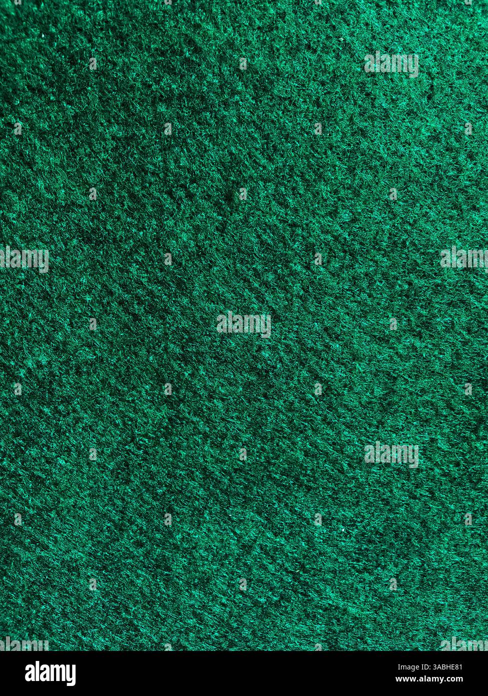 Tessuto di cotone verde per sfondo, motivo tessile naturale. - Immagine stock catturata con smartphone