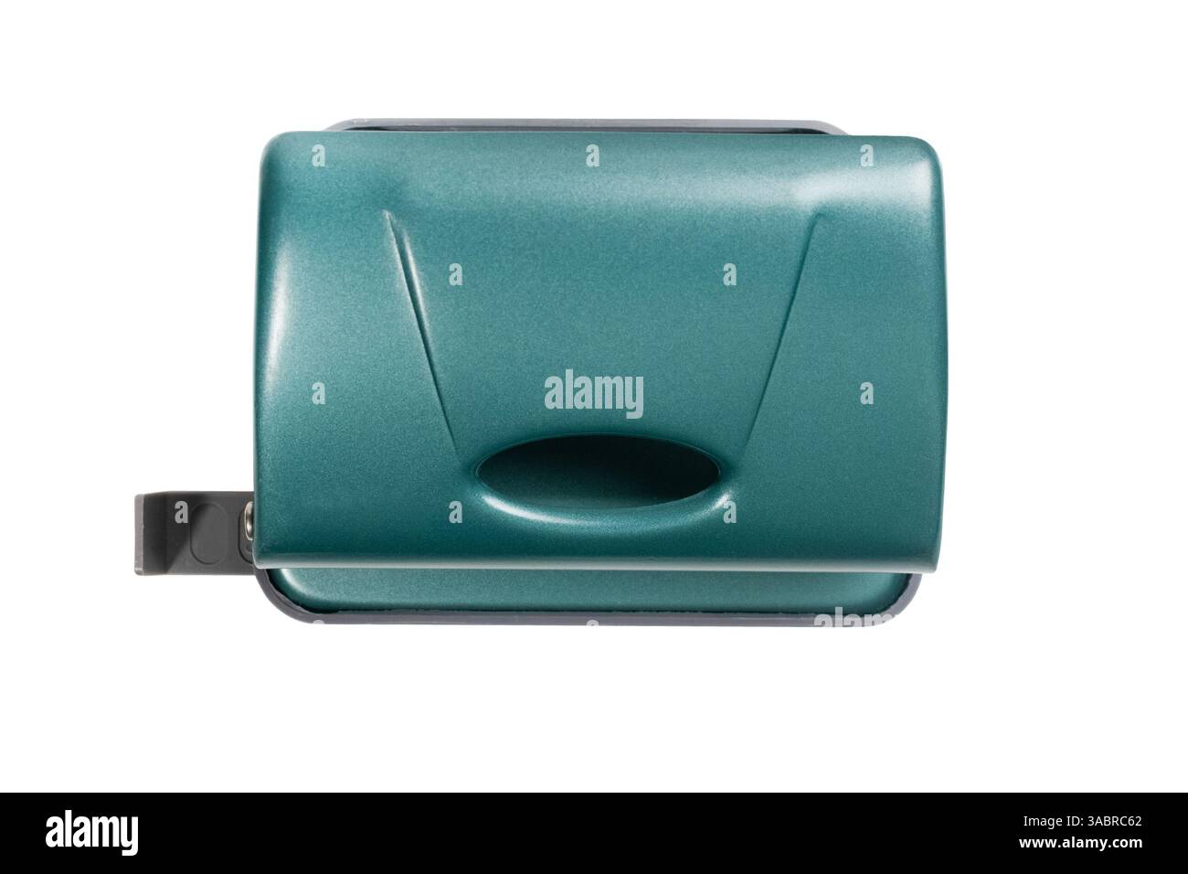 Primo piano di un perforatore verde in metallo, utilizzato per l'organizzazione della carta da ufficio e la gestione dei documenti. Foto Stock