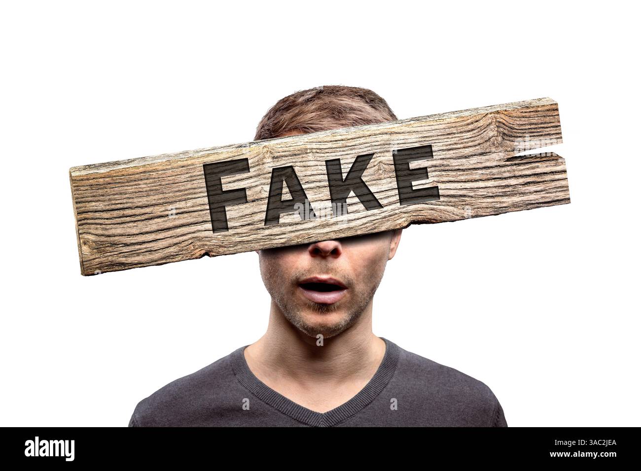 Un falso cartello di fronte alla testa di una persona isolata dallo sfondo Foto Stock